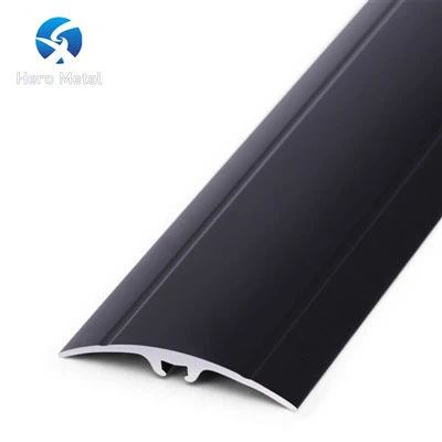 Laminatas prie plytelių perėjimo juostos